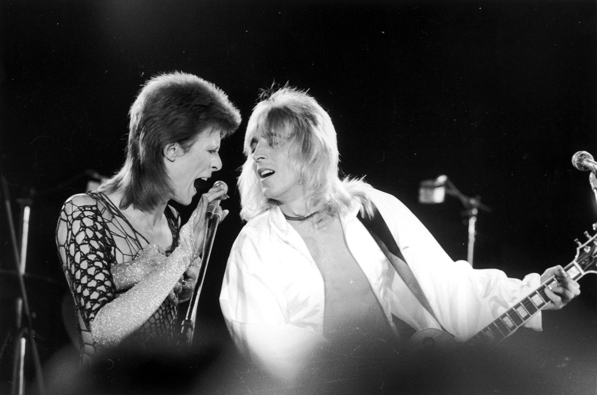 David Bowie (left) and Mick Ronson, onstage at a live recording of The 1980 Floor Show at The Marquee Club in London on October 20, 1973