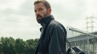 Mark Kimball (Ben Affleck) looks over his shoulder while carrying the ransom money in Animals.