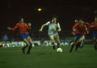 England's Paul Mariner is surrounded by Spain defenders in a friendly at Wembley in 1981.