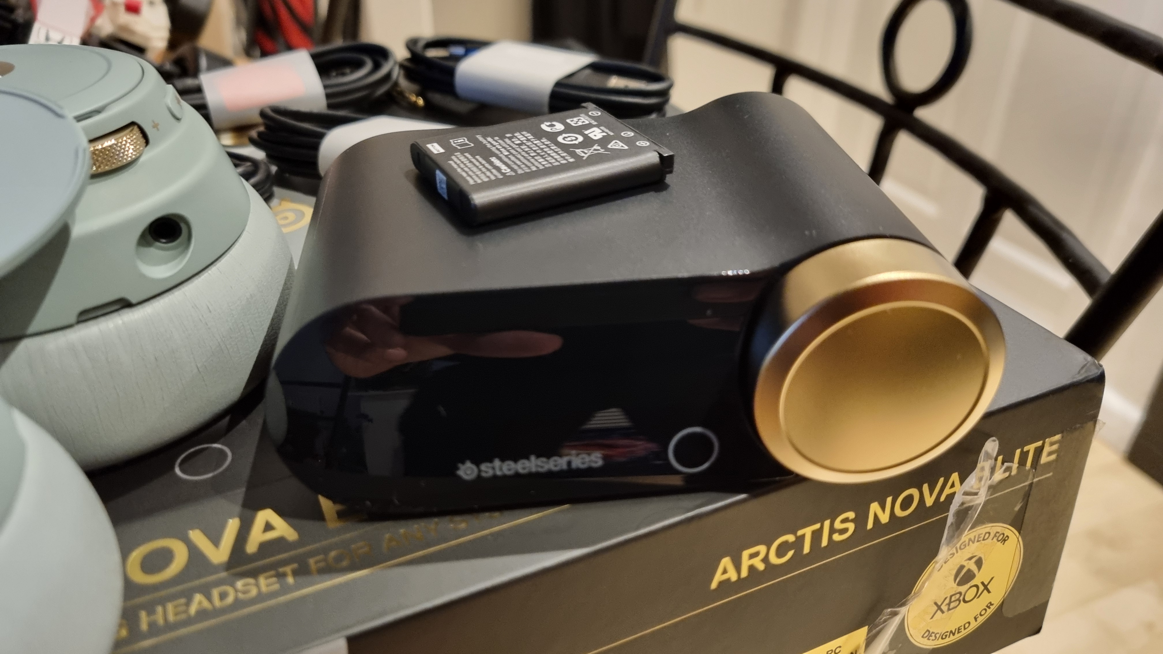 The SteelSeries Arctis Nova Elite gaming headset fresh out of its box, with included Game Hub DAC