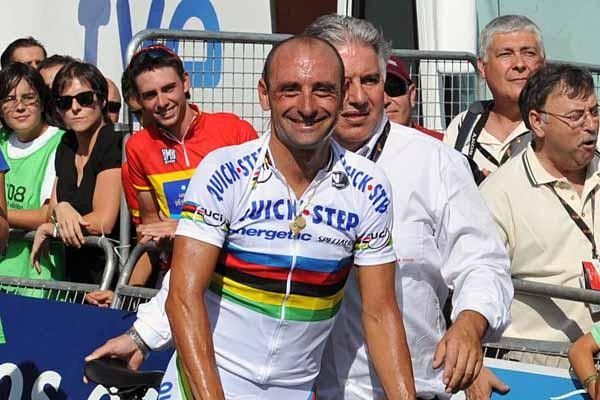 All smiles: Paolo Bettini (Quick Step) enjoys adding another win to his collection.