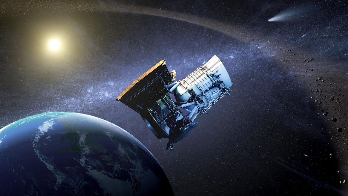 This artist concept shows the NASA WISE spacecraft, in its orbit around Earth