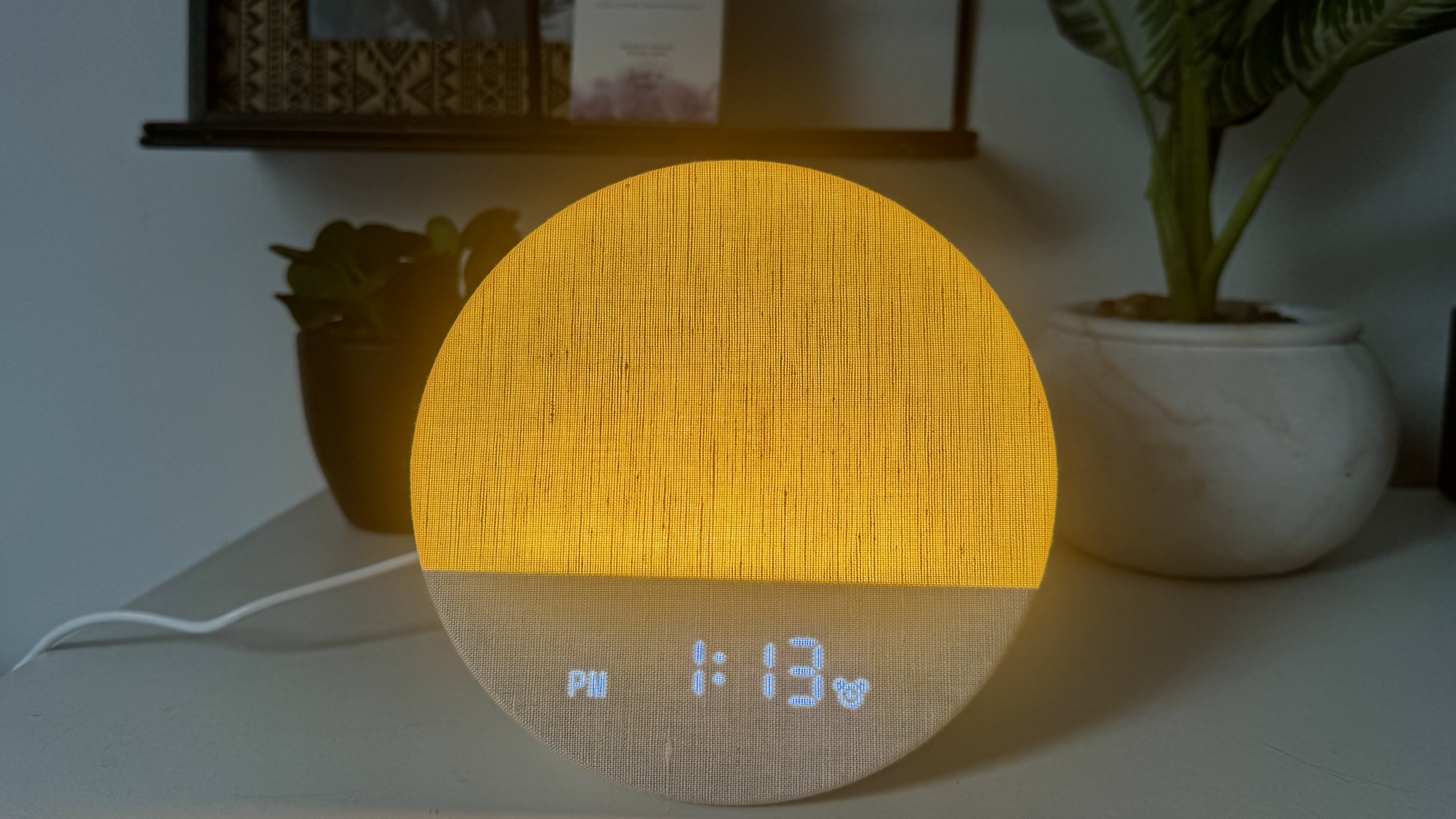 Our sleep tech reviewer testing the Dreamegg sunrise alarm clock