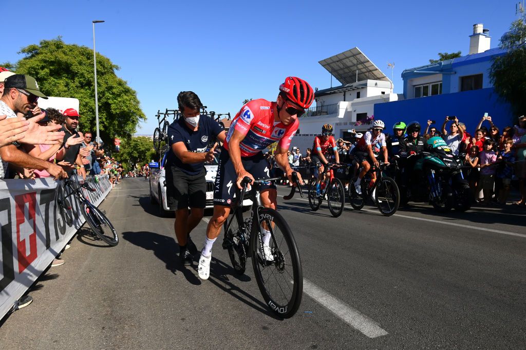 TOMARES SPAIN SEPTEMBER 06 Remco Evenepoel of Belgium and Team QuickStep Alpha Vinyl Red Leader Jersey dropped from the peloton after a mechanical problem in the final kilometres during the 77th Tour of Spain 2022 Stage 16 a 1894km stage from Sanlcar de Barrameda to Tomares LaVuelta22 WorldTour on September 06 2022 in Tomares Spain Photo by Tim de WaeleGetty Images