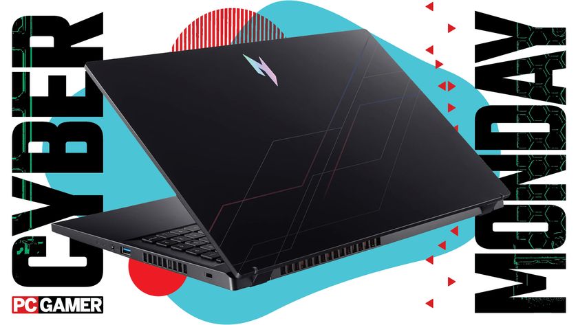 An Acer gaming laptop on a PC Gamer Cyber Monday Deals background