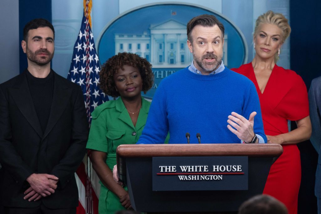 Brett Goldstein, Karine Jean-Pierre, Hannah Waddingham, and Jason Sudeikis in the White House briefing room