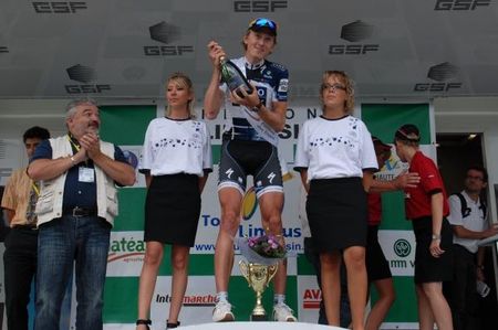 Stage winner Gustav Larsson (Saxo Bank) gets ready to soak all within a tight radius of the podium.
