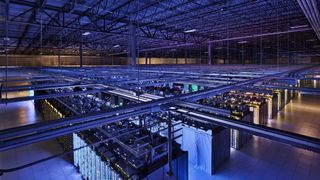 image of a server farm housed in a warehouse