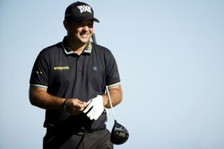 Patrick Reed pictured with a PXG cap and PXG driver