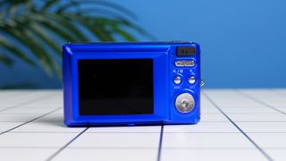 A blue AgfaPhoto Realishot DC5500 compact camera