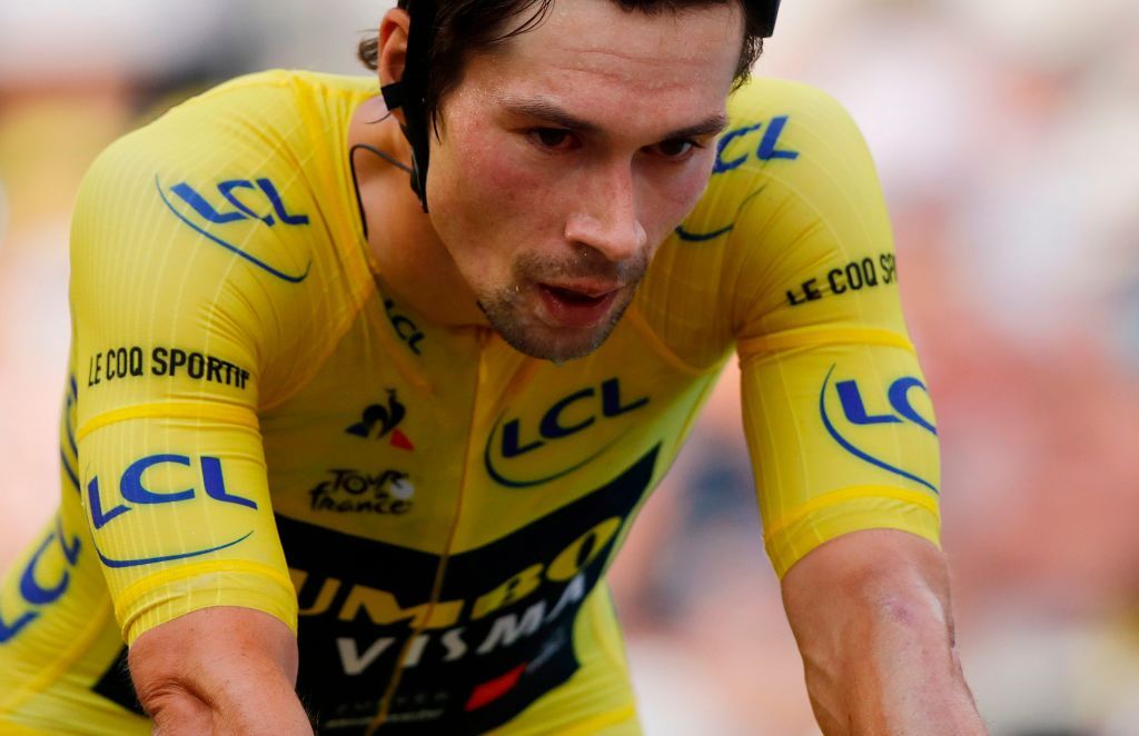 Team Jumbo-Visma rider Slovenias Primoz Roglic wearing the overall leaders yellow jersey crosses the finish line at the end of the 20th stage of the 107th edition of the Tour de France cycling race a time trial of 36 km between Lure and La Planche des Belles Filles on September 19 2020 Photo by Christophe Ena POOL AFP Photo by CHRISTOPHE ENAPOOLAFP via Getty Images