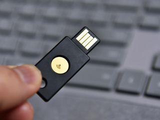 The YubiKey NEO costs $50 and lets you add 2FA to many services as well as unlocking your PC