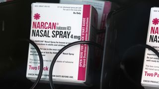 box containing narcan nasal spray pictured in a vending machine