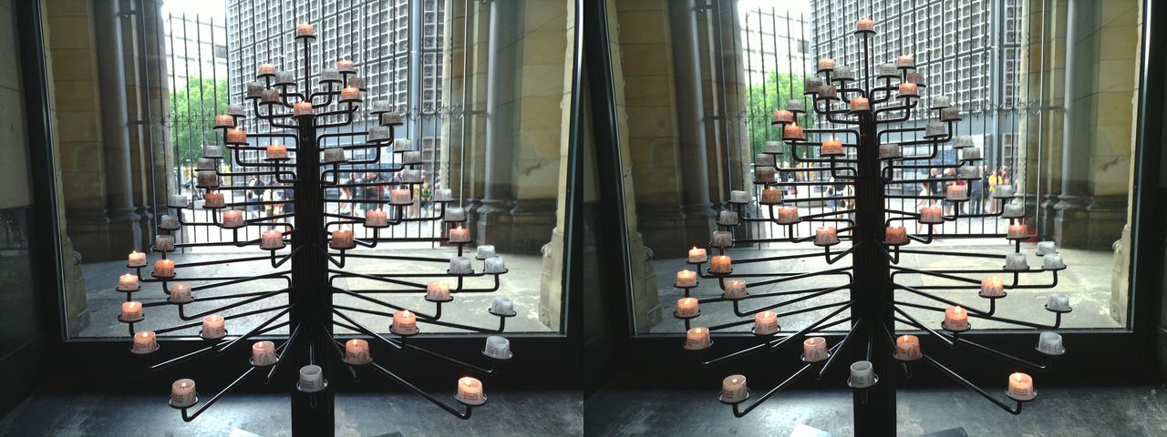 A 3D photo of a tree-shaped candle holder