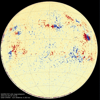 A yellow sphere with small red and blue patches.