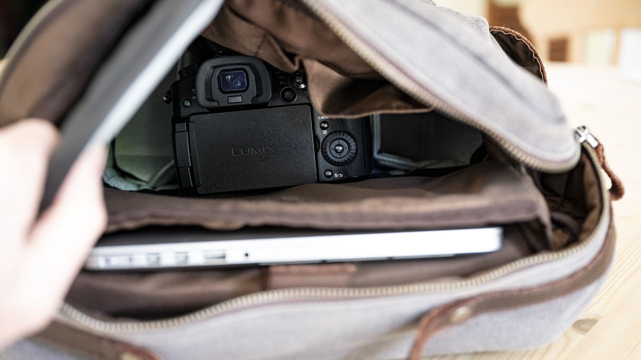 Peak Design Camera Cubes inside a regular bag on wooden table outside