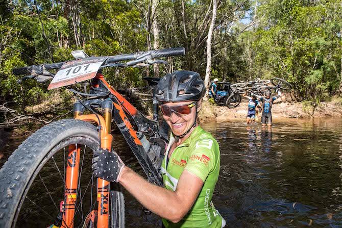 Elite women's leader Angelika Tazreiter appears to be enjoying herself during the river crossing on stage 7 of the 2019 Crocodile Trophy
