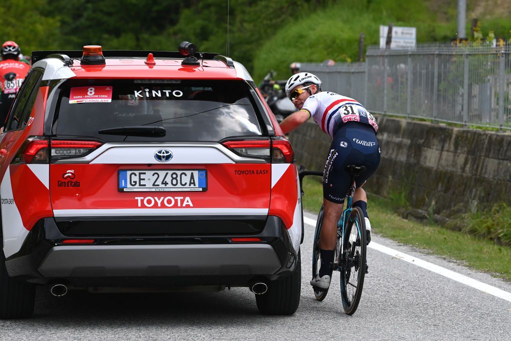 RIVOLI ITALY MAY 18 Mark Cavendish of The United Kingdom and Astana Qazaqstan Team in conversations with the race director car during the 106th Giro dItalia 2023 Stage 12 a 185km stage from Bra to Rivoli UCIWT on May 18 2023 in Rivoli Italy Photo by Tim de WaeleGetty Images