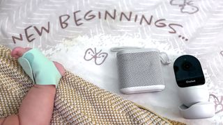 Three baby gadgets in a crib.