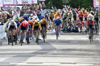 Arnaud De Lie can be seen on the ground behind the sprint on stage 1 of the 4 Jours de Dunkerque