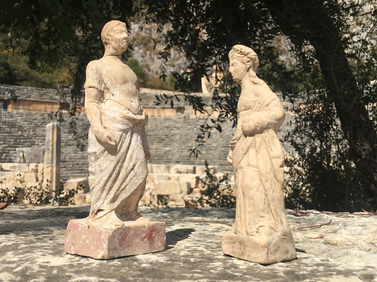 The terracotta figurines included mortals such as this woman and man.
