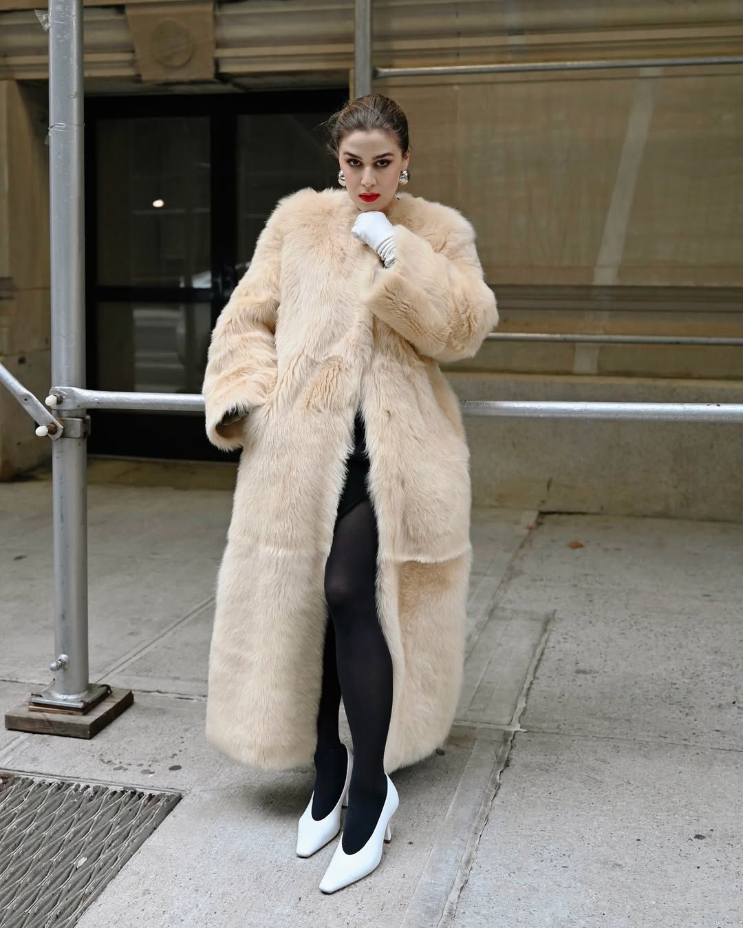 Christina Grasso wearing white pumps
