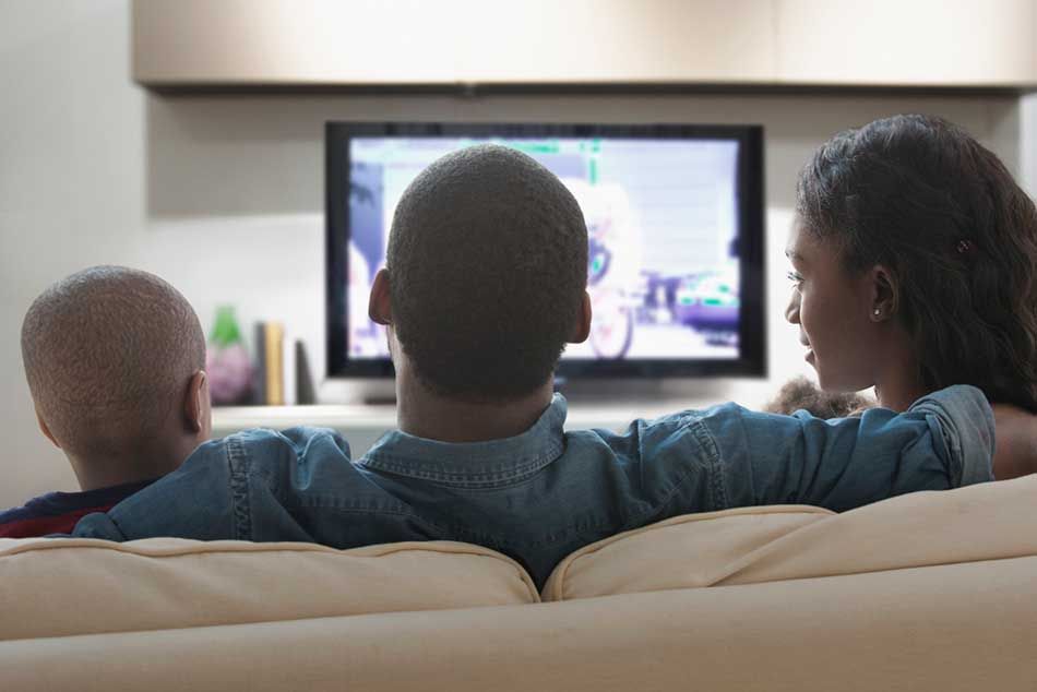 Family watching TV