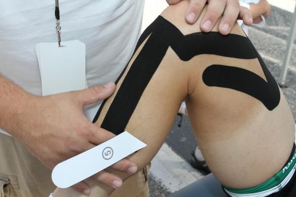 Lucas Euser gets the tape treatment on the knee which was severely damaged almost exactly a year ago when he was struck by a car while training in Girona, Spain.