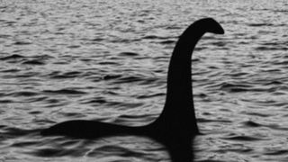 A grainy black and white photo of an alleged loch ness monster sighting