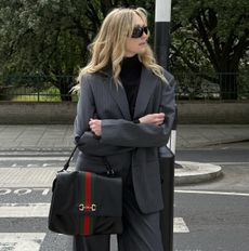 Jane McFarland carrying the Gucci Paparazzo bag