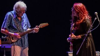 John Mayall and Carolyn Wonderland perform on stage at the Teatro Cervantes on October 9, 2019 in Malaga, Spain