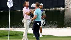 Freddy Schott and Calum Hill shake hands 