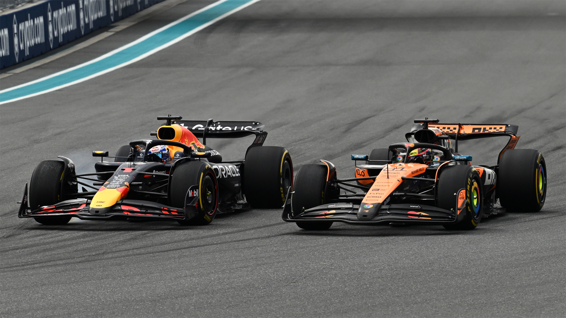 Max Verstappen and Oscar Piastri racing at the 2025 Miami Grand Prix