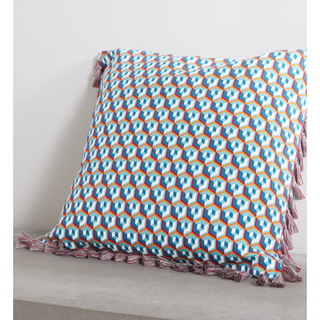 pillow with a colorful geometric pattern