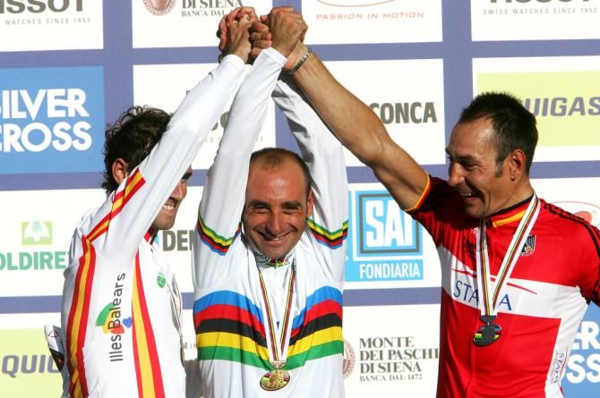 The 2006 Worlds podium celebrate Paolo Bettini's (Italy) win