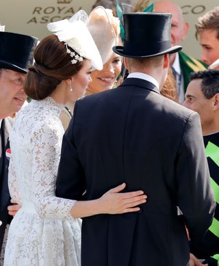 Prince William and Kate Middleton touch at Royal Ascot