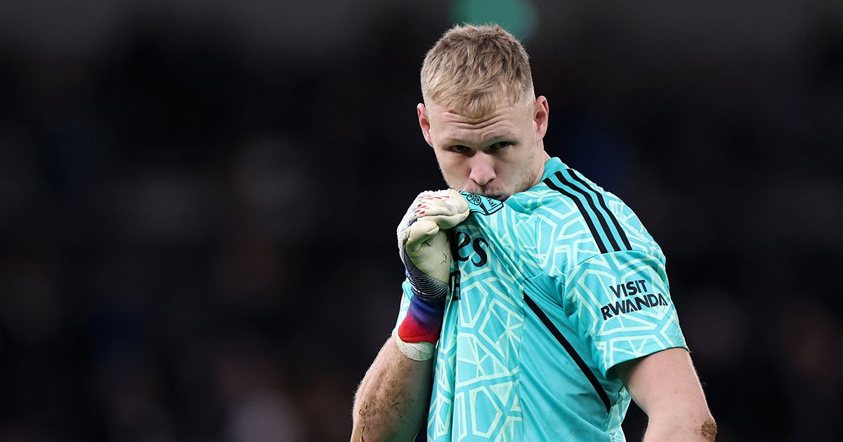 Aaron Ramsdale of Arsenal kisses the badge in front of Tottenham Hotspur fans after the team&#039;s victory during the Premier League match between Tottenham Hotspur and Arsenal FC at Tottenham Hotspur Stadium on January 15, 2023 in London, England.