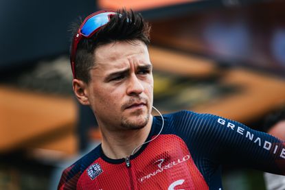 Tom Pidcock looks pensively in Ineos Grenadiers kit