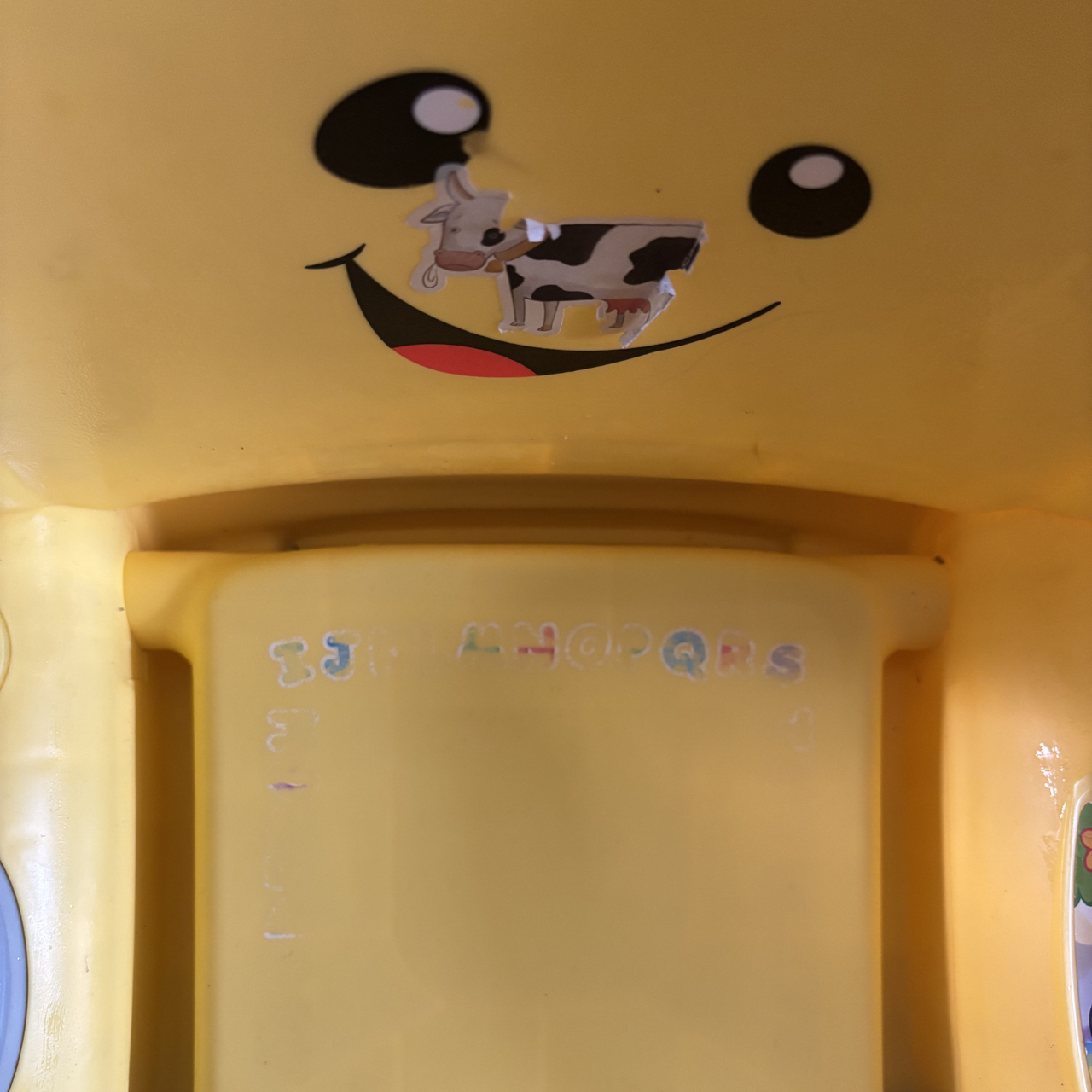 Yellow plastic kids chair after using the Beldray Digital Handheld Steam Cleaner