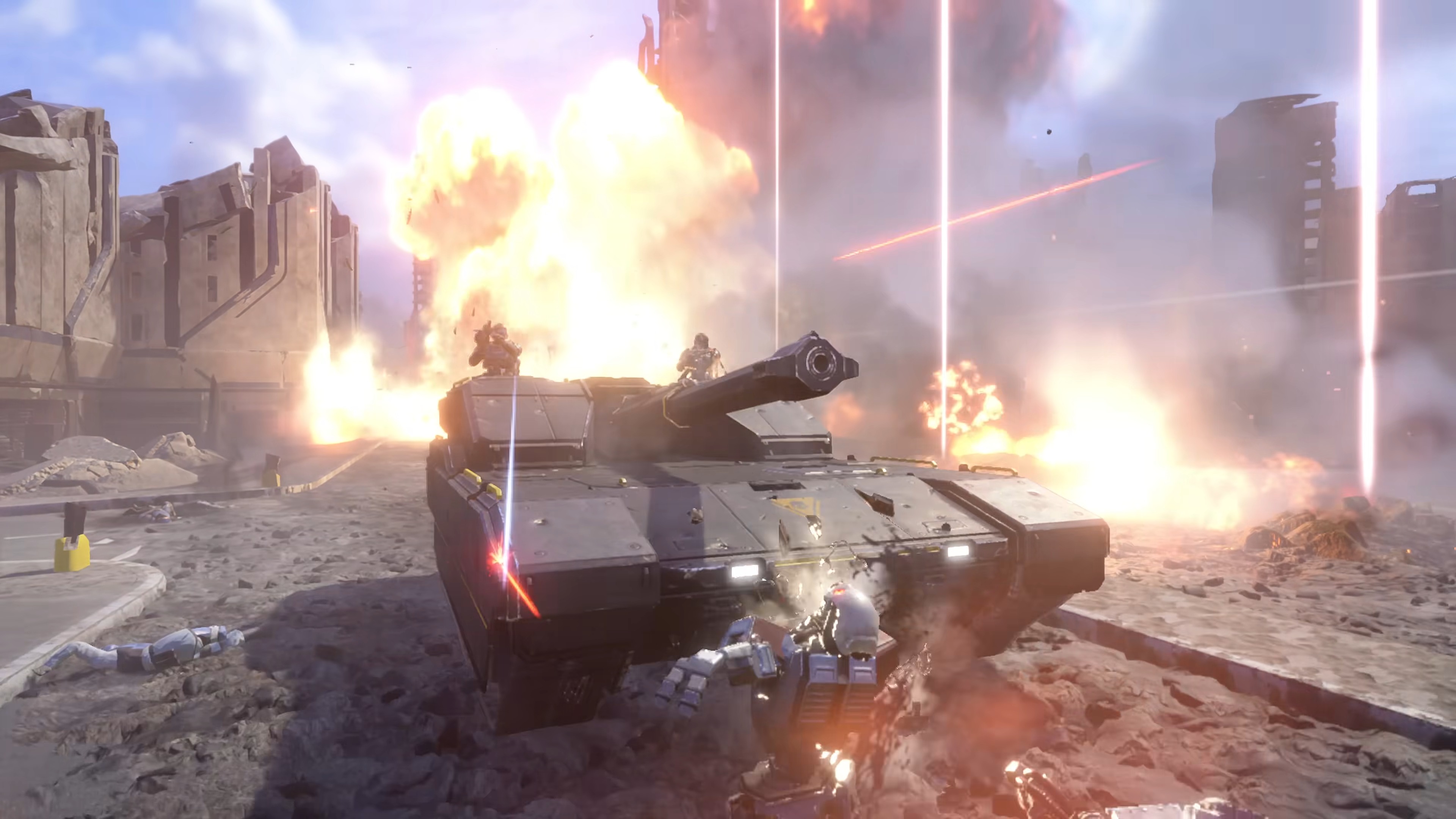 Helldivers 2 helldivers driving and riding in Bastion tank as it runs over a robot