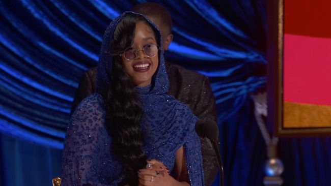 H.E.R. wins best original song along with Dernst Emile II and Tiara Thomas for "Fight for You" from 'Judas and the Black Messiah'