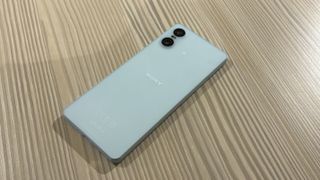 Xperia 10 VI in blue on a wooden table