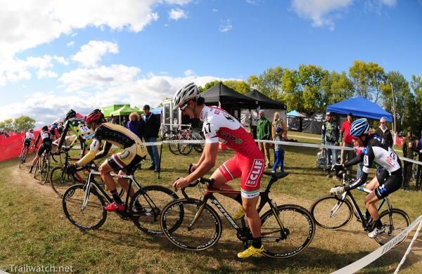 Elite men rounding a turn on lap one