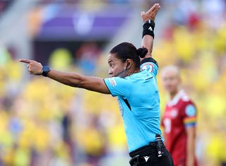 Referee Edina Alves gestures during the UEFA Women's EURO 2025 Group C match between Denmark and Sweden at Stade de Geneve on July 04, 2025 in Geneva, Switzerland.