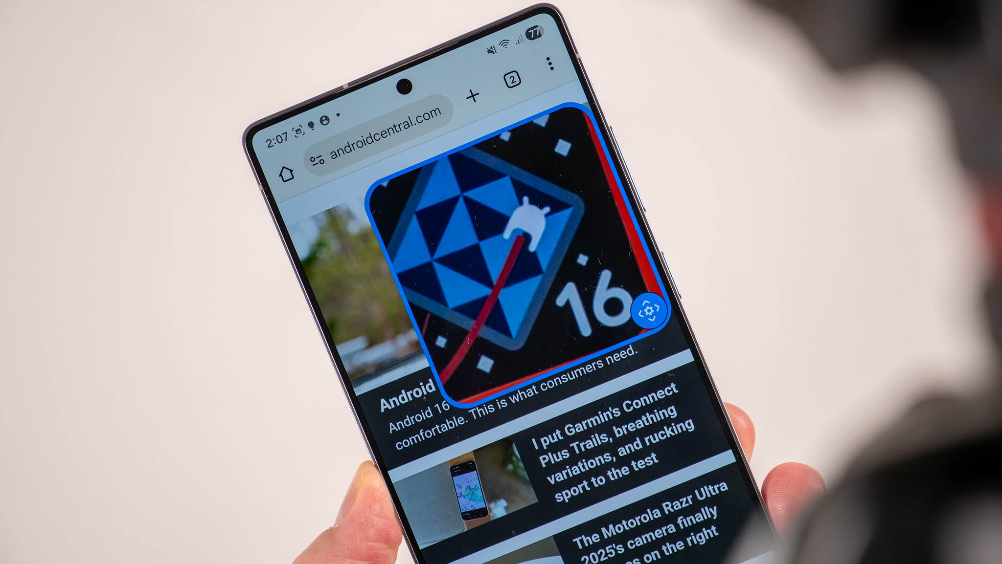 Using the upgraded zoom accessibility feature in One UI 8 to see an Android 16 logo on the Android Central website up close