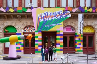 The curatorial team outside Superpower Studios