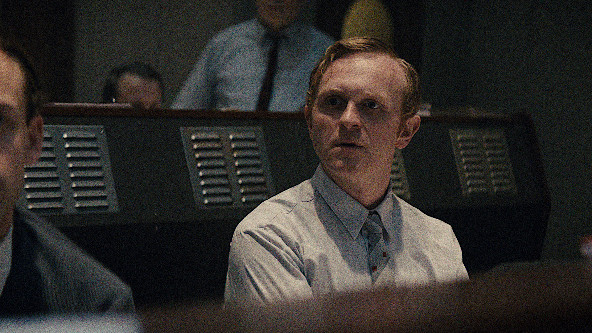 a spaceflight engineer in a control room