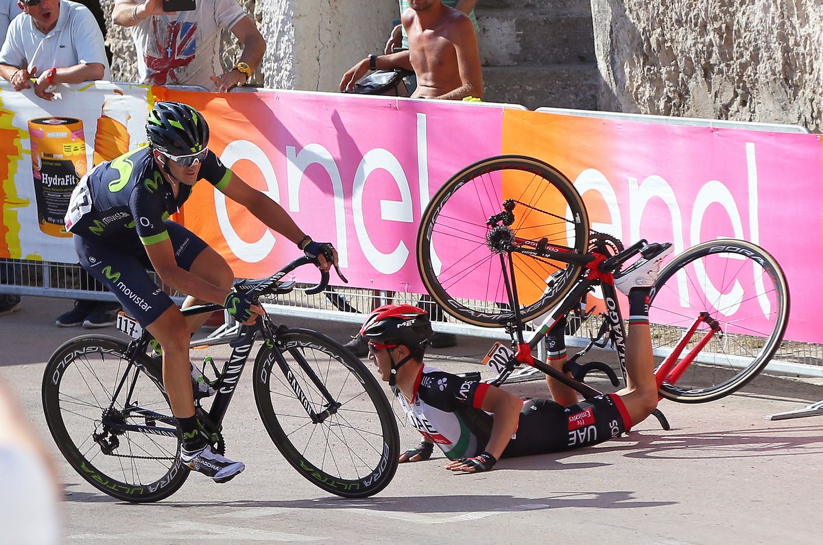 Valerio Conti (UAE Team Emirates) takes a tumble inside the final kilometre