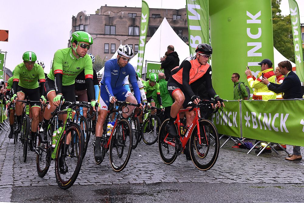 The riders roll out in the rain