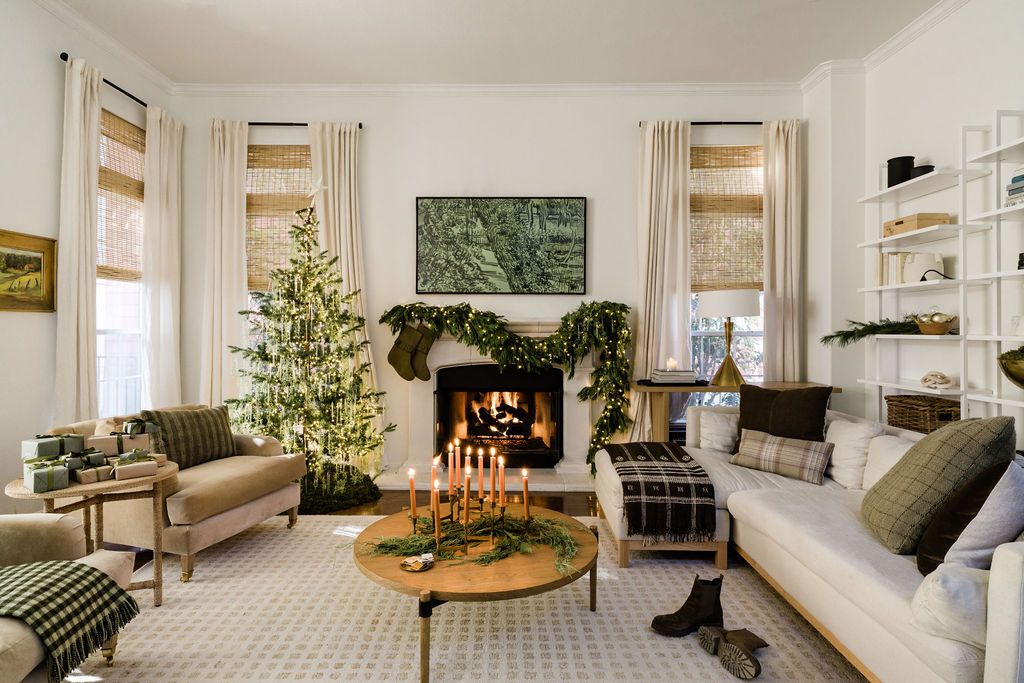 A living room with green and white decor